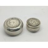 Two Silver boxes inset with coins (2)