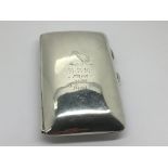 An English silver cigarette box of rectangular sha