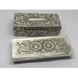 Two Silver boxes both repousse chased with flowers