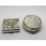Two Silver boxes one inset with a coin The other r