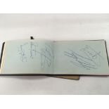 An Ipswich Town autograph book containing various player's signatures, circa 1980s, including