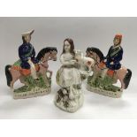 Two Staffordshire flatback figures of soldiers on horseback plus one other of one of Queen