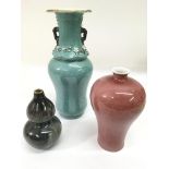 Three Chinese monochrome vases, comprising a peach