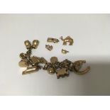 A 9ct gold charm bracelet 61 grams approx