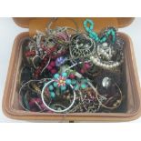 A large collection of costume jewellery in a jewellery box - NO RESERVE