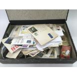 A box of loose postage stamps, cigarette cards and Concorde memorabilia.