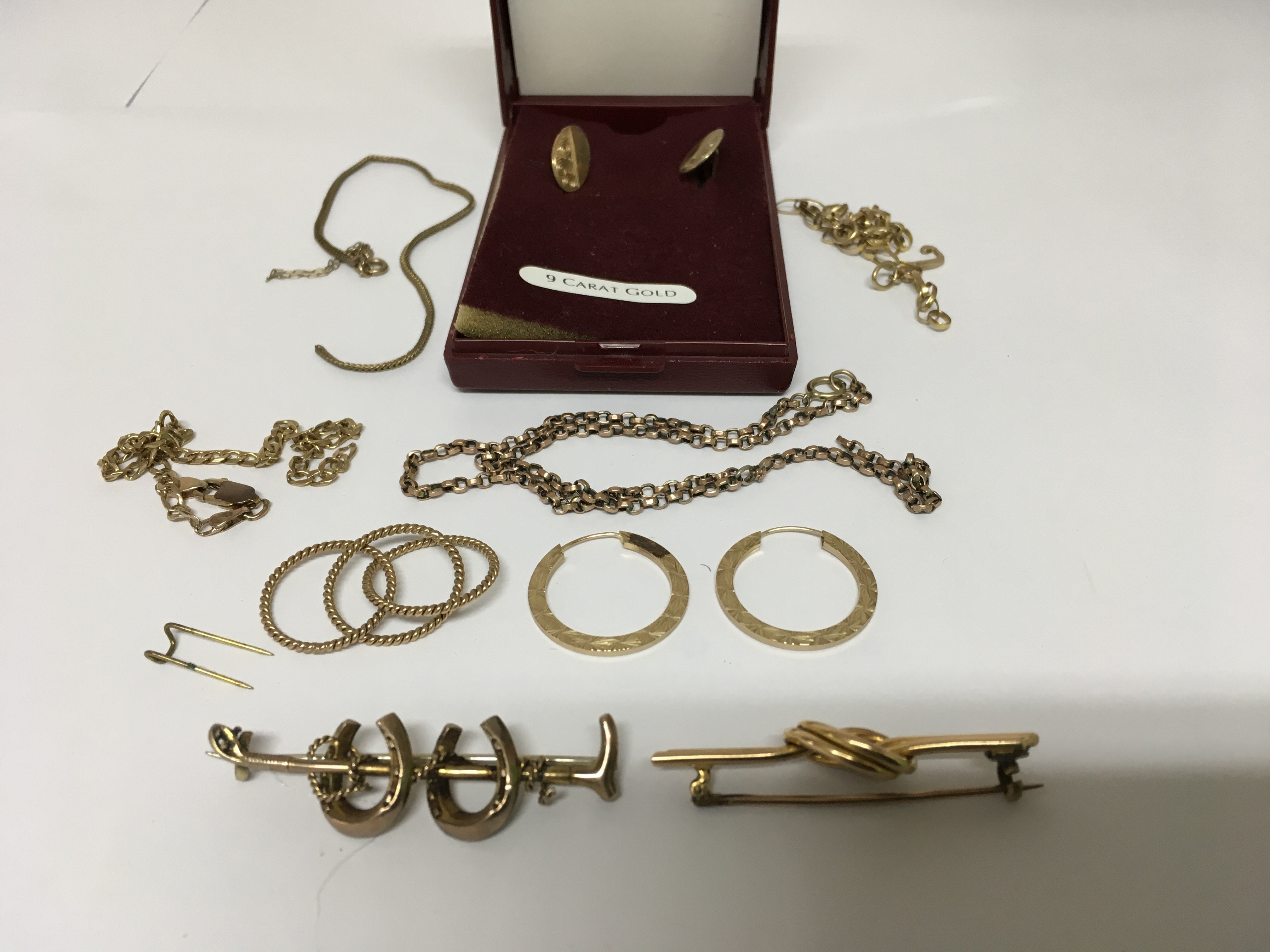 A collection of gold and gold tone jewellery including cufflinks and two Edwardian brooches