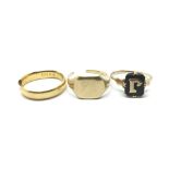 A broken 22ct gold ring and two other gold rings, one damaged. 22ct gold ring weighs approx 5 grams,