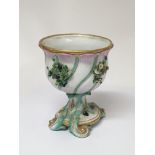 A 19th century Meissen Porcelain bowl on stand decorated with raised flowers some damage. Height