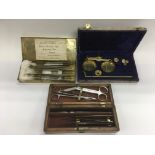 Two sets of surgeon's scalpels and a cased set of brass scales (3) - NO RESERVE