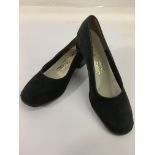 A pair of Salvatore Ferragamo suede court shoes, small size.