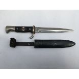A WW2 Hitler youth knife bearing Solingen makers mark with scabbard. Blade length approx 15cm, total