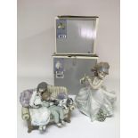 Two boxed Lladro figures, 'Floral Path' and 'Big Sister'. No damage or restoration