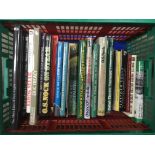 A box containing a collection of books on trains,