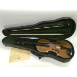 A 1901 French violin by Collin Mezin of Paris in a fitted case with two bows. Includes a copy of the