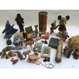 A collection of vintage toys including a Batman dart gun , Micky and Minnie Mouse figures , Basil