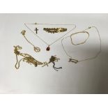 A small collection of gold and gold tone jewellery, mainly comprising of chained jewellery and