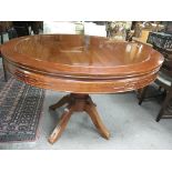 A hardwood Chinese dining table with six chairs. Table measures approx 121.5cm across x 81cm tall.