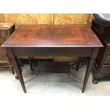 An Edwardian mahogany occasional table with a single drawer. Table measures approx 76cm long x