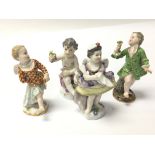 Four 19th century Meissen Porcelain figures. A dancing figure with a fan others holding flower