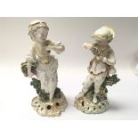 A Pair of English porcelain figures possible Derby late 18th Century decorated with raised flowers
