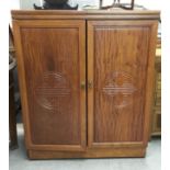 A Chinese hardwood drinks cabinet with fitted interior and folding top. Measures approx 91.5cm