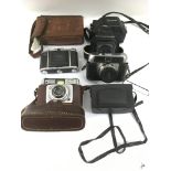 Five old cameras including an Ilford Sportsman