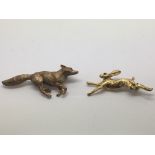 Two Harriet Glen 9ct gold brooches comprising a fox with ruby eyes and a hare with sapphire eyes,