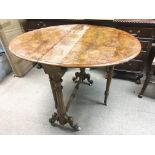 A Victorian burr walnut Sutherland table. Measures approx 83cm x 73cm tall x 103cm.