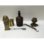 A group of brass and other items to include an inkwell without lid, a humpty dumpty money box, an