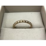 A 9ct gold eternity ring. Approx O - NO RESERVE