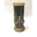 A 19th century French Serves Porcelain vase with a powder green glaze and applied gilt metal mounts,