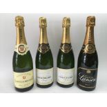 Four bottles of champagne comprising a Lanson, Comte De Brismand and two Louis Chaurey.