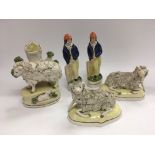 Two Staffordshire cricketer figures and three sheep (5) - NO RESERVE