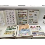 Six albums of GB and world stamps.