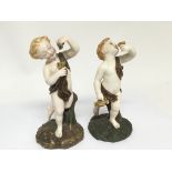 A pair of 19th Century Worcester porcelain figures young Bacchus on naturalistic bases, height