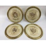 A set of four, circular framed decorative pressed flower plaques - NO RESERVE