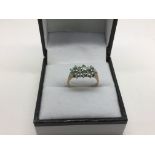 A 9ct gold emerald and diamond ring, approx 2.2g and approx size J.