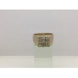 A gents 9ct gold signet ring set with nine diamonds, approx 0.5ct, approx 13g and approx size U.
