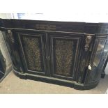 A Victorian boulle credenza gilt mounted with a pair of inlaid brass doors flanked by a pair of