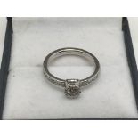 A platinum diamond ring, approx 3.8g and approx size I.