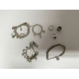 A silver charm bracelet and other silver and white metal jewellery pieces - NO RESERVE