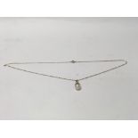 A 9ct gold necklace with a pearl pendant. Weight approx 2.2g. Length 45cm.