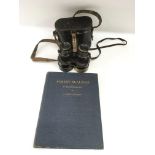A leather cased pair of Stanley binoculars and a limited edition copy of 'Robert McAlpine a