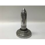 An unusual chrome bullet shaped table lighter. Height approx 20cm.