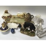 A collection of oddments an onyx pen tray porcelain lids and stoppers and other oddments.