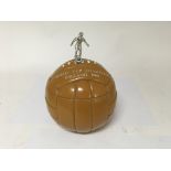 An ice pale commemorating the 1966 World Cup win for England, in the shape of a football with a