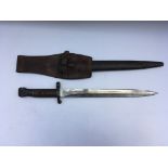 A British SMLE bayonet, possibly a prototype 9/68. Marked. Blade length approx 30cm, 42cm total.