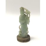 A Carved green jade Chinese figure of a goddess on a gilt metal base height 12.5cm