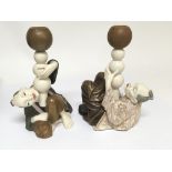 A rare and unusual pair of Worcester porcelain candle holders in the form of oriental figures